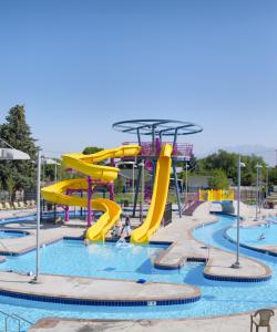 Swimming pool slide tower and lazy river photo